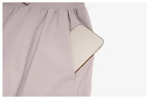 Close-up of quick-dry pants pocket showing large capacity for a smartphone