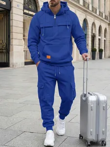 Full-length view of royal blue men's hooded tracksuit set with cargo pants detail.