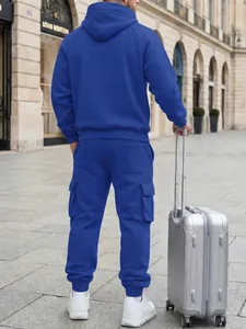 Detail showing the back view of a royal blue hooded sweatshirt and cargo trousers