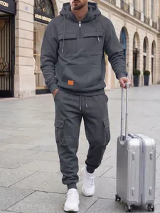 Detail view of men's dark gray hooded tracksuit with cargo pockets and urban style