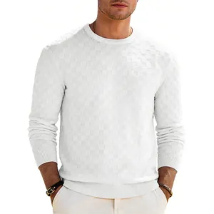 Detail view of a white crewneck sweater featuring a textured checkerboard jacquard pattern.