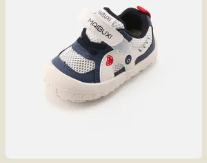 Breathable toddler soft-sole mesh sneakers in navy and white with adjustable strap