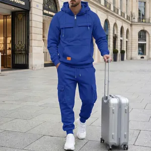 Men's royal blue cargo hooded tracksuit set shown in a stylish outdoor street setting