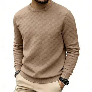 Detail of camel checkerboard jacquard crew neck sweater for men with waffle texture.