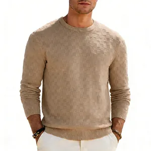 Detail of men's crewneck sweater featuring a textured checkered jacquard pattern
