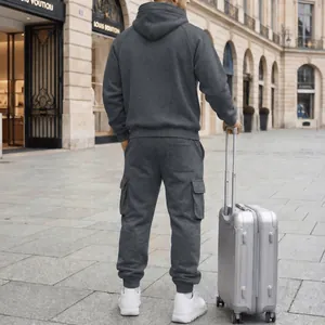 Back view of men's charcoal grey hooded sweat suit set featuring functional cargo pockets