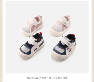 Full view of stylish toddler sneakers featuring pink and navy blue anti-slip designs.