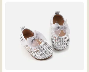 Silver woven baby princess shoes with bow detail and soft non-slip soles
