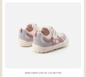 Detailed rear view of pink and gray toddler sneakers featuring anti-slip soft rubber soles