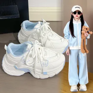 Girls white and blue chunky sneakers with embroidered butterfly details and platform sole