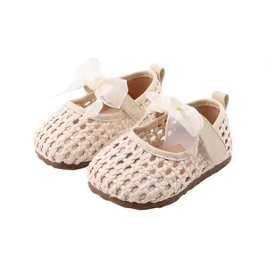 Elegant beige woven baby girl princess shoes with soft soles and white mesh bows