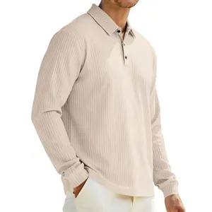 Macro view of the vertical ribbed texture on a beige men's long sleeve polo shirt
