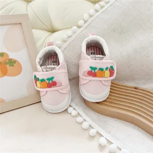 Pink soft-sole baby walking shoes with cute 3D fruit appliques and easy velcro strap