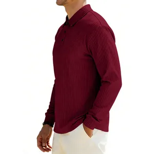 Detailed side view of a burgundy long-sleeved polo shirt with vertical ribbed texture