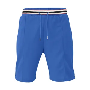 Vue détaillée du short de sport bleu à séchage rapide avec taille élastique rayée et cordon