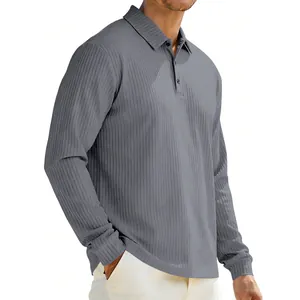 Detail view of a grey long-sleeved polo shirt featuring vertical ribbed texture and collar.