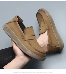 Detailed view of brown thick-sole leather loafers for men featuring a premium matte finish