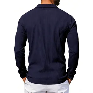Back view of a navy blue long-sleeved polo shirt with vertical ribbed texture detail.