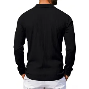 Back view of men's black long-sleeve polo shirt showing premium ribbed knit texture.