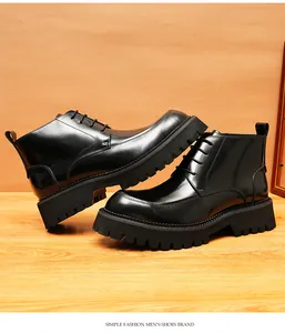 Detail view of black leather Men's Martin boots with thick lug soles and lace-up design