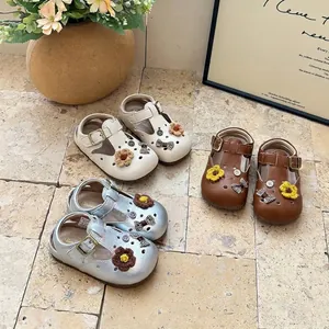 Three colors of girls' hollow-out Birkenstock sandals with cute crochet flower decor