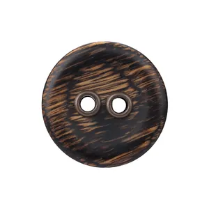Premium round dark ebony wood button with two metal eyelets for high-end outerwear