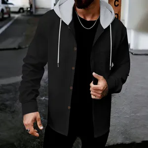 Close-up detail of the waffle-knit fabric on this black men's hooded button jacket