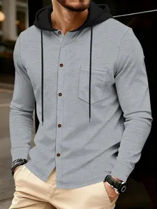 Close-up detail of a grey men's waffle knit long sleeve hoodie featuring buttons and pocket