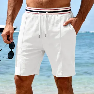Detail showing the white waffle texture and striped waistband of men's casual shorts.