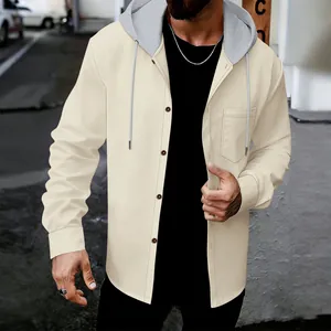 Detailed view of men's cream waffle knit button-up hooded shirt with chest pocket