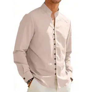 Detail showing the stand-up collar and button placket of a beige men's ethnic style shirt.
