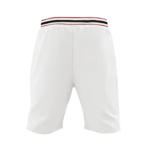 Detail view of white breathable athletic shorts featuring tricolor striped waistband.