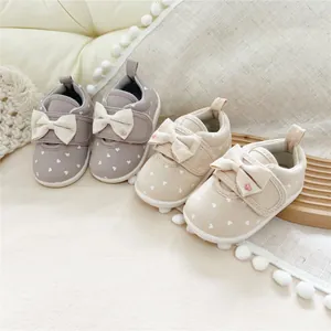 Sweet soft sole baby girl walking shoes with decorative bow knot and heart patterns