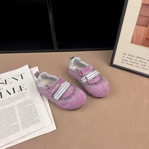 Stylish purple girls' breathable mesh sneakers featuring soft soles and velcro straps