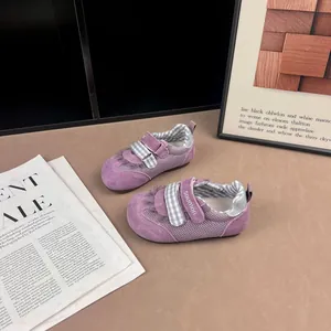 Detail of purple breathable mesh sneakers for toddler girls with strap
