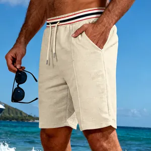 Detail showing the waffle knit texture and striped elastic waistband of men's summer shorts