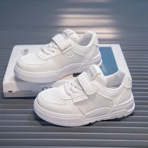 Premium white children's sports sneakers with breathable mesh and velcro strap