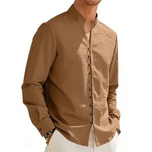 Detailed view of camel long-sleeved shirt featuring a stand collar and multiple buttons