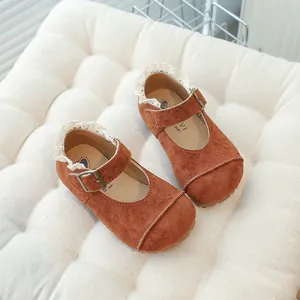 Vintage brown suede children Mary Jane shoes with delicate lace collar and buckle strap