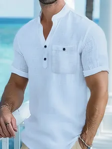 Close-up of a white textured short sleeve henley shirt with a chest pocket and buttons.