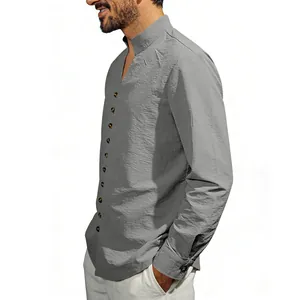 Side profile detail of gray cotton-linen stand-collar shirt with brown buttons