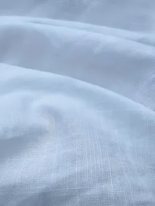 Close-up of breathable white linen texture on men's relaxed polo shirt