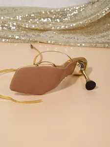 Detail view of elegant gold square toe stiletto sandal featuring anti-slip sole texture