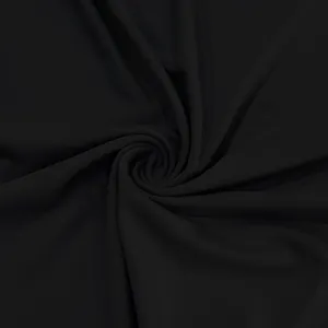 Macro detail of black ribbed breathable fabric used in men's athletic quick-dry T-shirts
