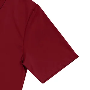 Close-up of double stitching on the sleeve of a burgundy red quick-dry sports T-shirt