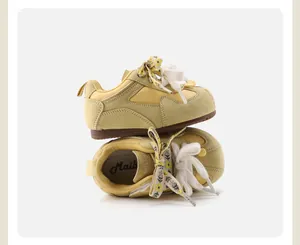 Soft-soled yellow retro toddler sneakers with floral lace details and stacked layout