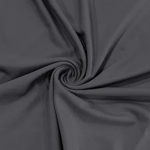 Close-up of dark grey quick-dry breathable fabric with fine twill texture and drape.