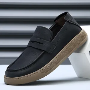 Casual black leather loafers for men with thick brown rubber sole and slip-on design