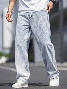Detail view of light blue snow-washed straight leg jeans for men's casual wear
