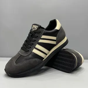 Baskets d'entraînement allemandes vintage pour hommes en cuir noir et gris et daim